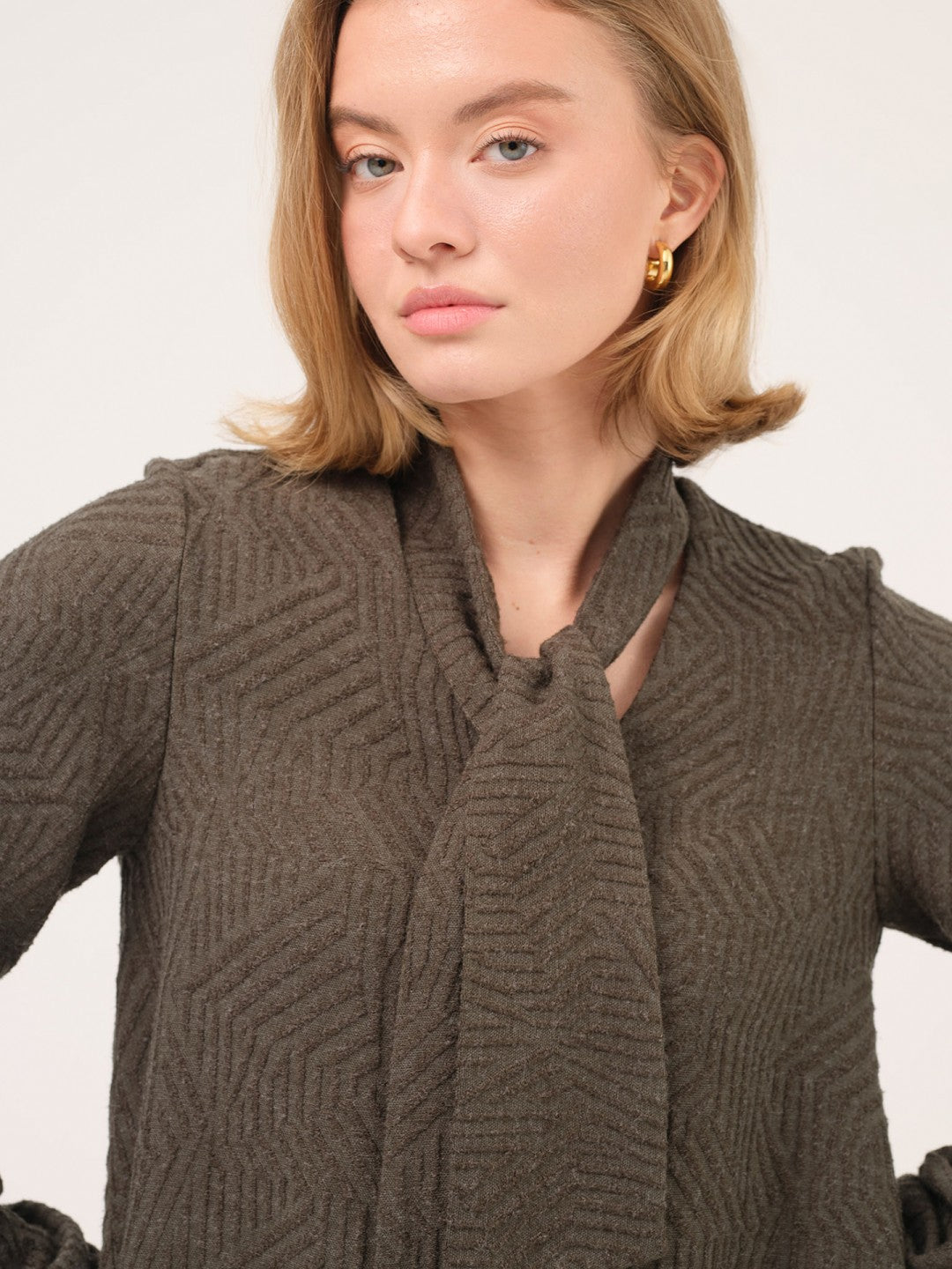 Camisola de malha verde militar Cristina Barros costas